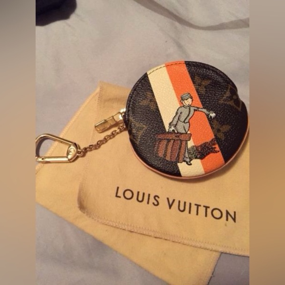 Authentic limited edition Louis Vuitton coin pouch with bag chain